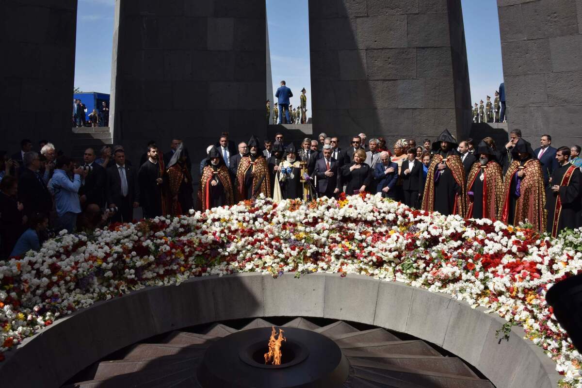 Armenian President Serzh Sarkisian and actor George Clooney were among those in attendance at a ceremony at the Genocide Memorial in Yerevan on April 24, 2016, to commemorate the 101st anniversary of the World War I-era Armenian genocide in the Ottoman Empire.