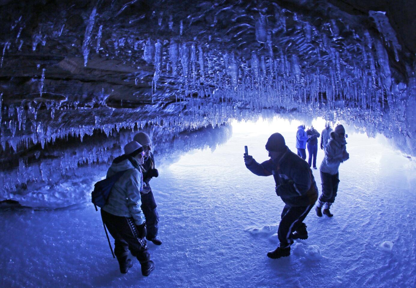 Posing for ice cave photos