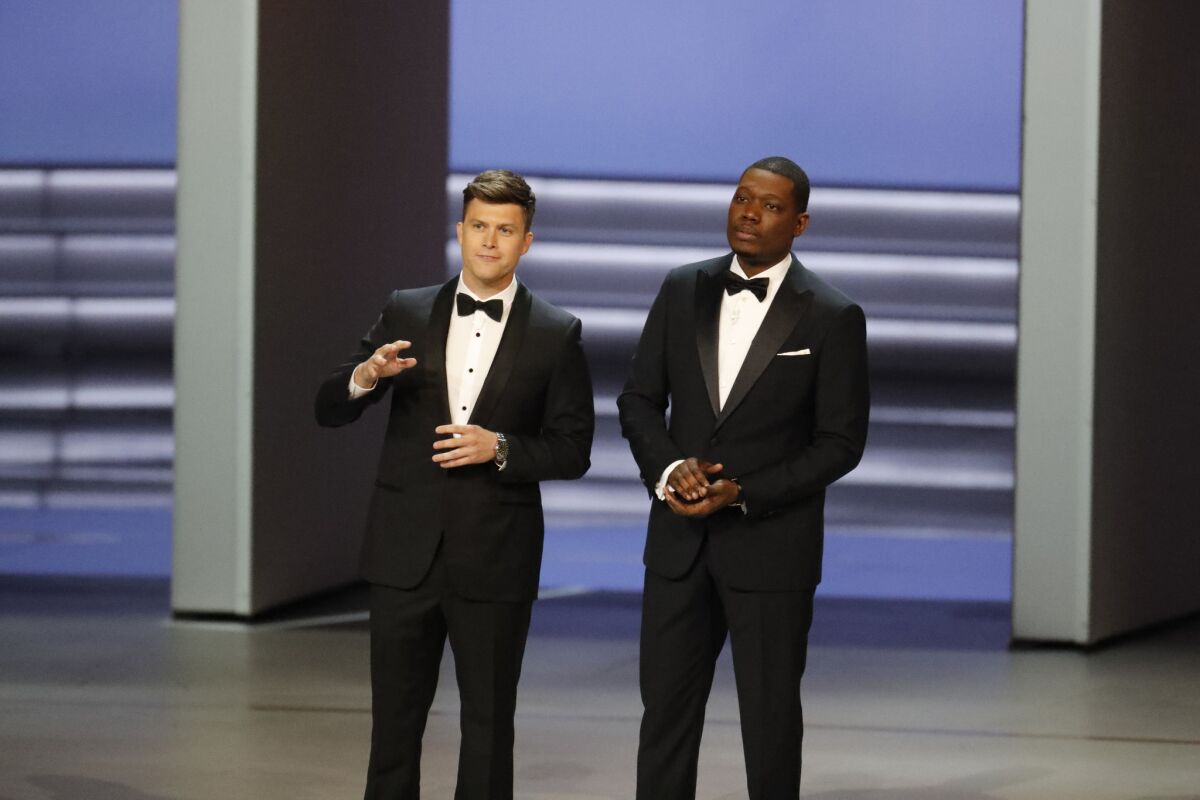 Hosts Colin Jost and Michael Che during the show at the 70th Primetime Emmy Awards.