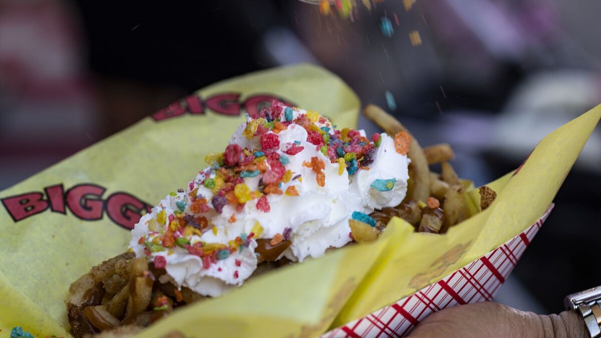 Biggys' caramel crack fries are sprinkled with Fruity Pebbles cereal.
