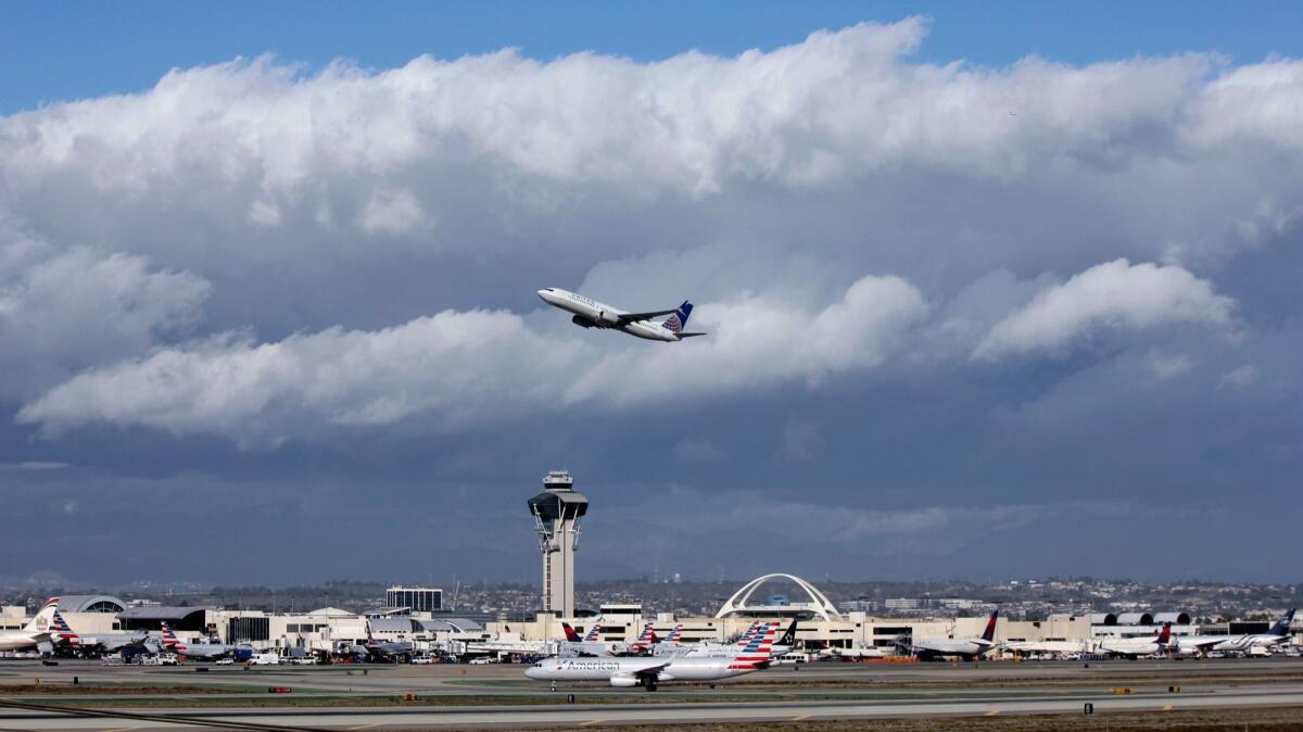 A passenger jet takes off from Los Angeles International Airport, which has been the repeated target of lawsuits challenging modernization projects.