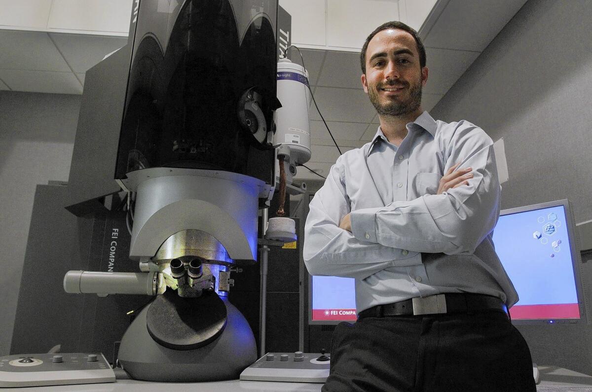 Edward Miracco, a biochemist at UCLA, raised $6,215 through crowdfunding to buy extra time on an electron microscope for his study of an enzyme that helps cancer cells grow.
