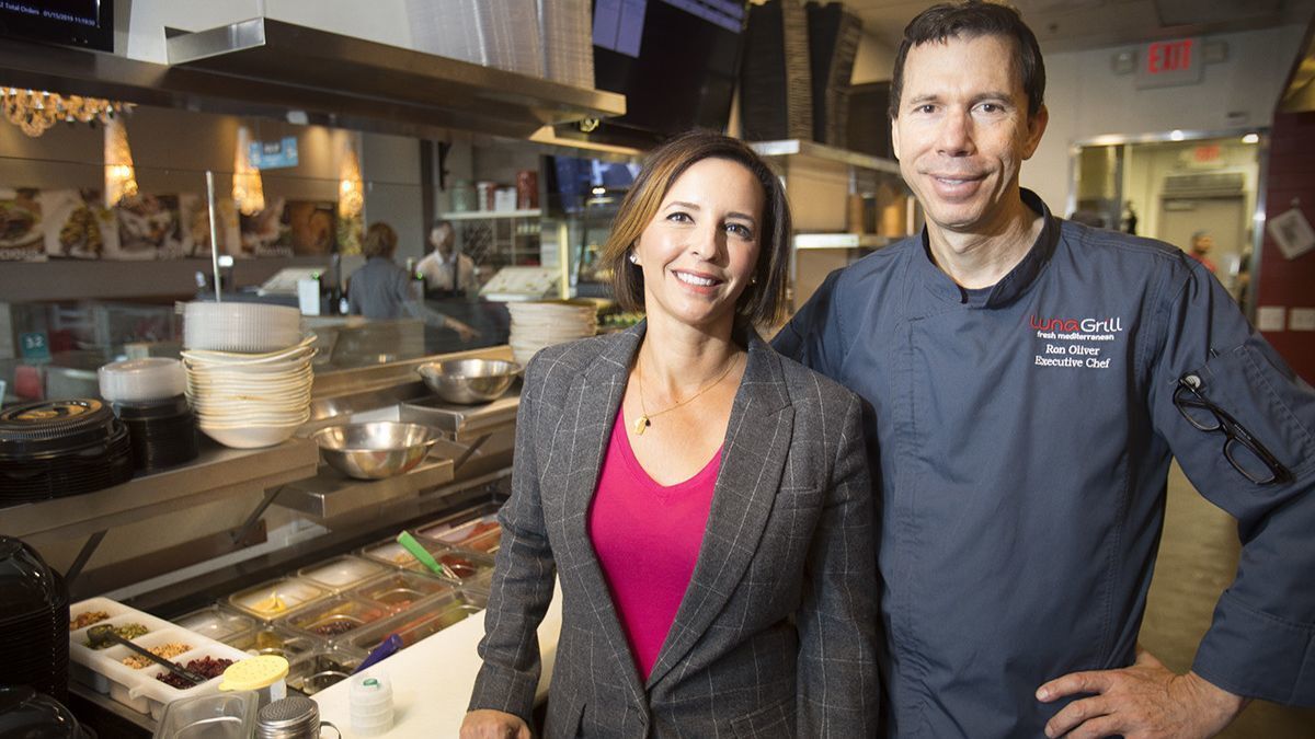 Maria Trakas Pourteymour and Ron Oliver in the kitchen at Luna Grill's Scripps Ranch location.