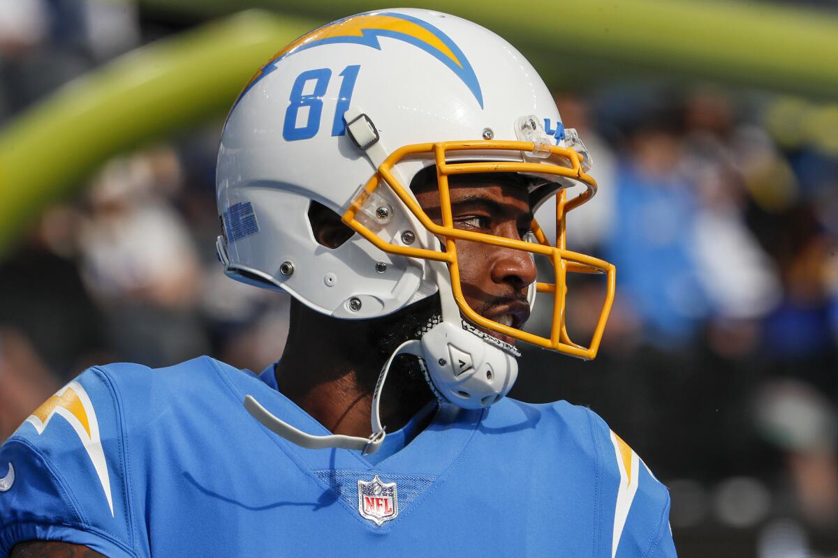 Chargers wide receiver Mike Williams stands on the field before a game.