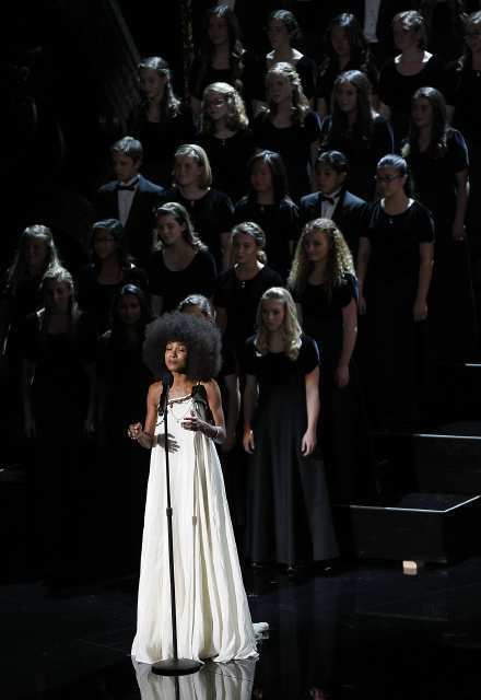 The "In Memoriam" segment of the Academy Awards featured Esperanza Spalding and the Southern California Children's Chorus singing the classic "What A Wonderful World" so strongly associated with Louis Armstrong.