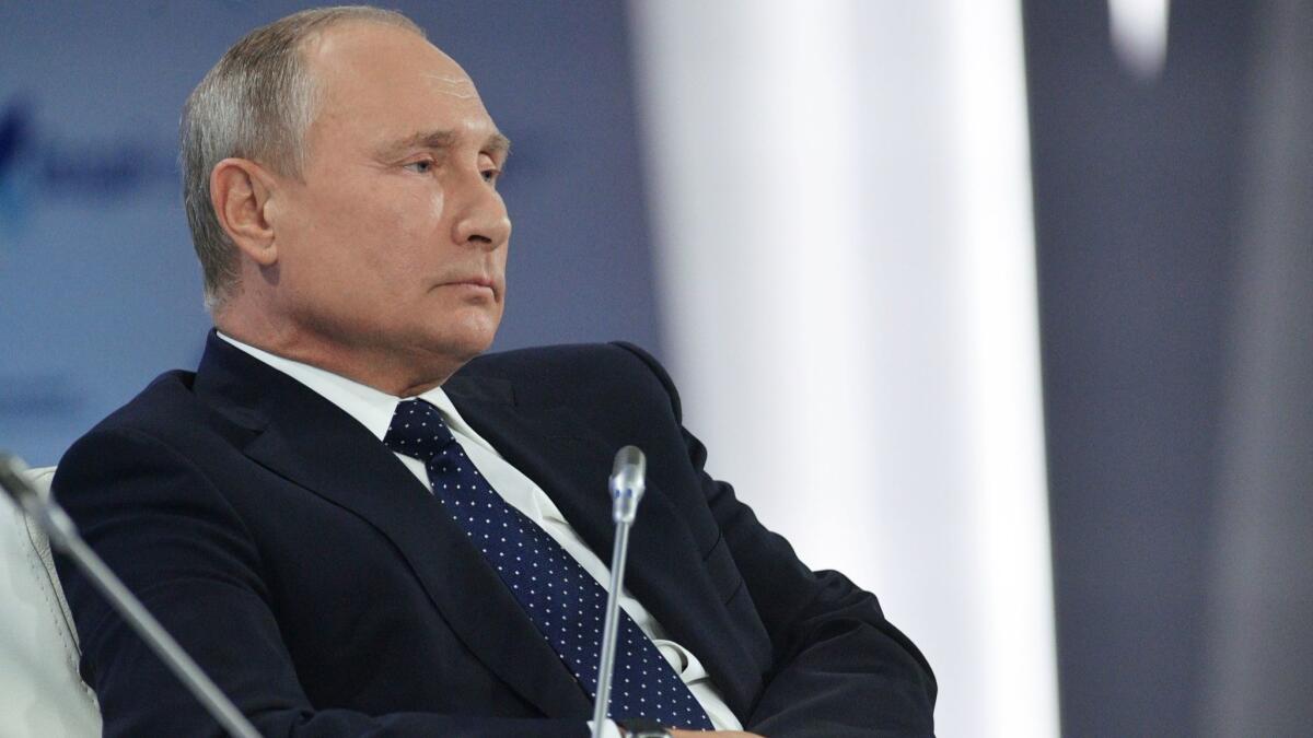 Russian President Vladimir Putin attends an international policy forum in Sochi, Russia, on Oct. 18.
