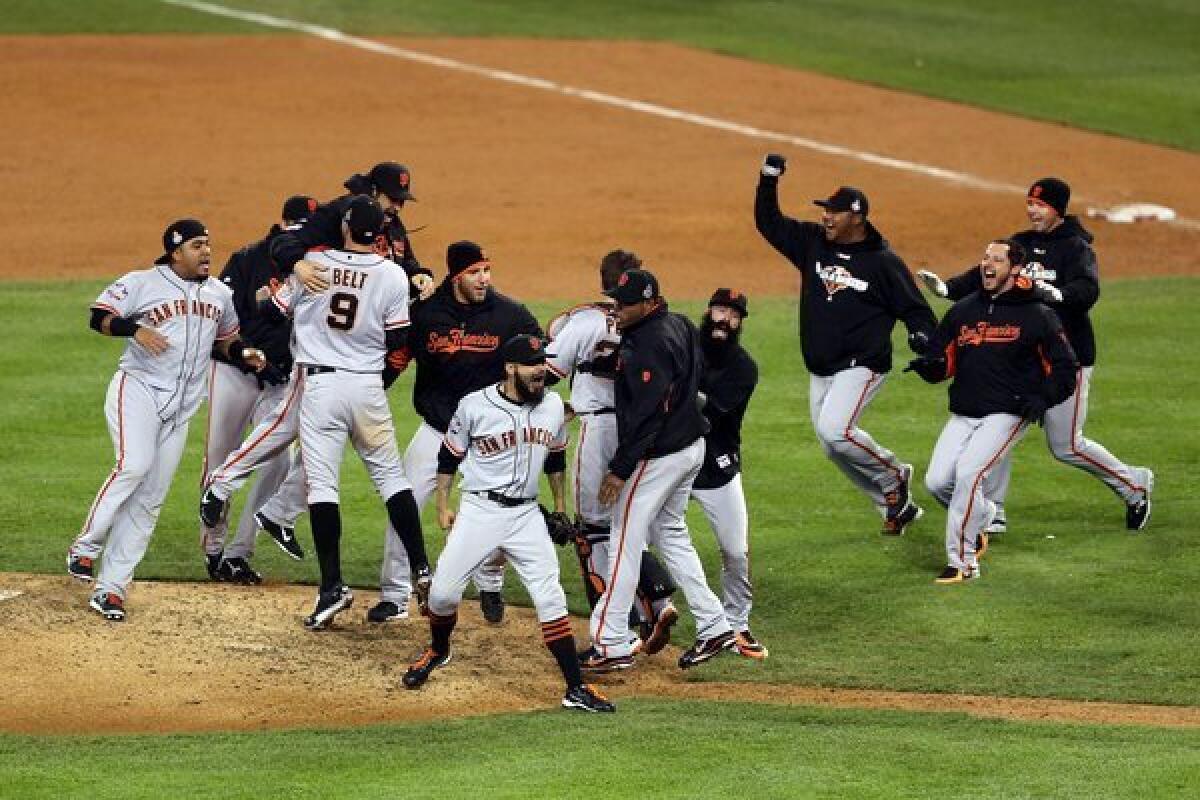 Members of the San Francisco Giants celebrate after clinching their second World Series title in three years back in October.