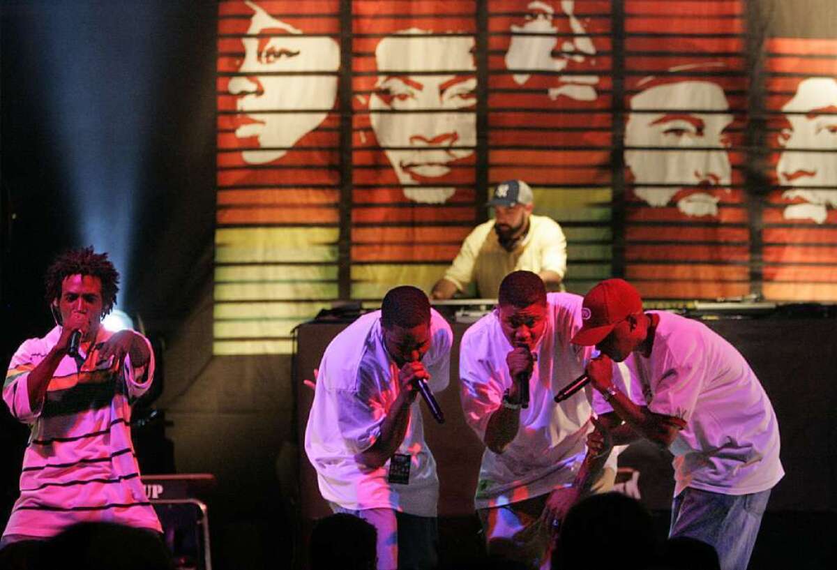 The reunited L.A.-based hip-hop crew Jurassic 5 includes Akil, left, Soup, Chali 2na, Marc 7 and DJ NuMark, in the background.