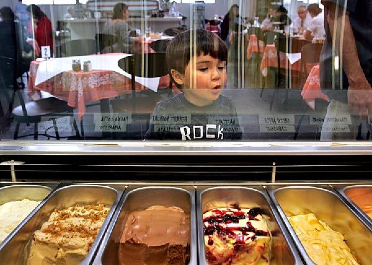 Garran Smith, 4, ponders some of the two dozen gelati offered at Eatalian restaurant.