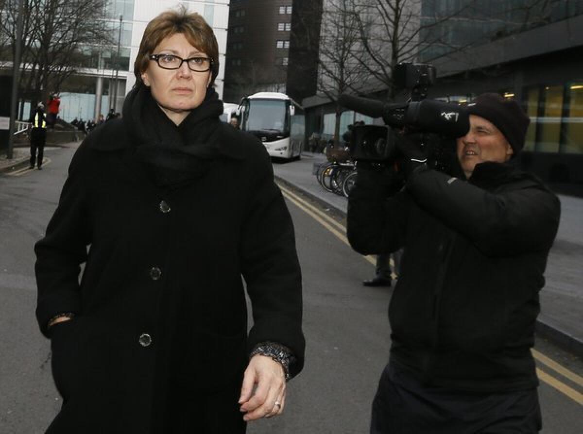 April Casburn, a senior counterterrorism detective with Scotland Yard, was found guilty Thursday of trying to sell confidential information to a British tabloid. Casburn is the first police officer to be convicted in a corruption probe spawned by Britain's phone-hacking scandal.