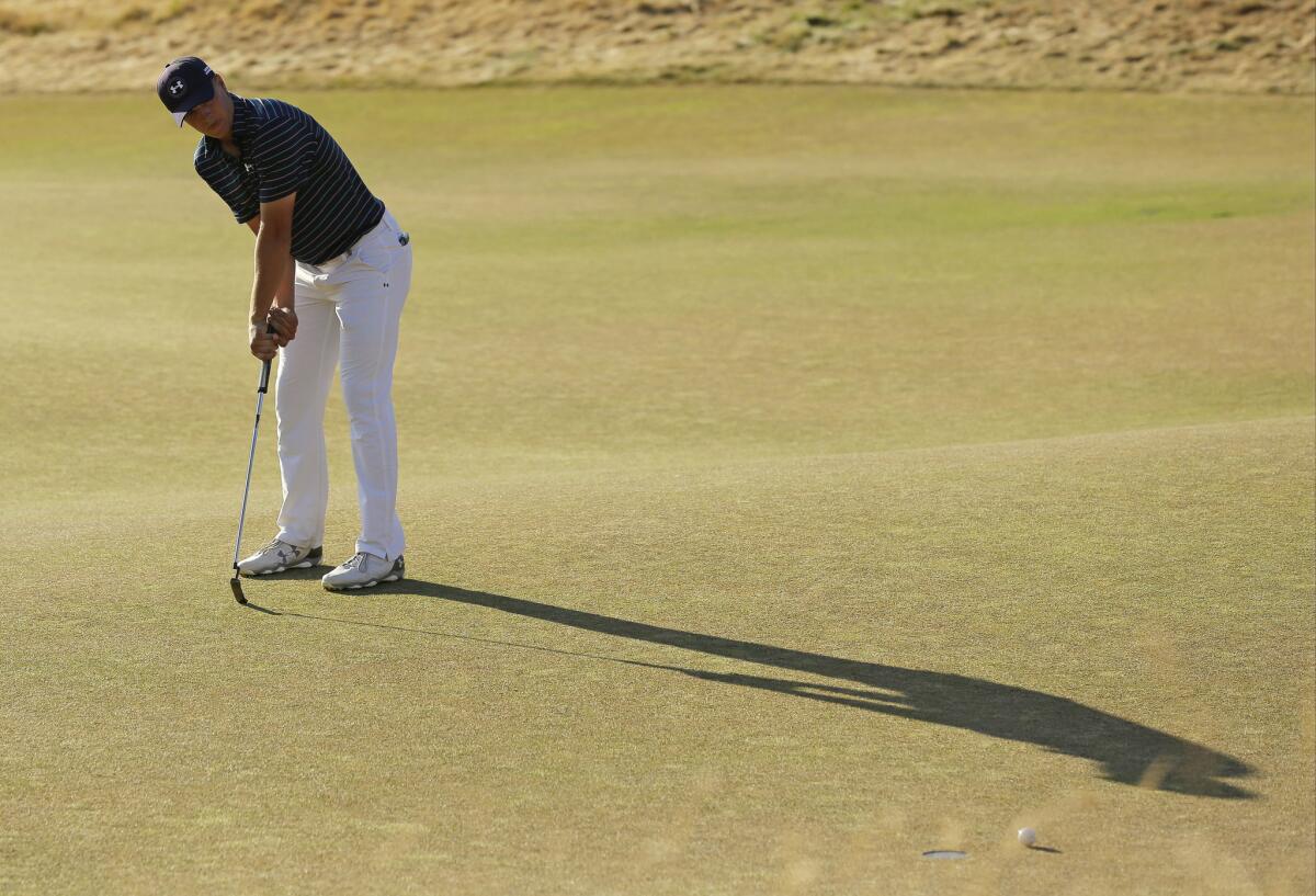 Jordan Spieth misses a putt for eagle on the 18th hole during the final round of the 115th U.S. Open at Chambers Bay in Univeristy Place, Wash.