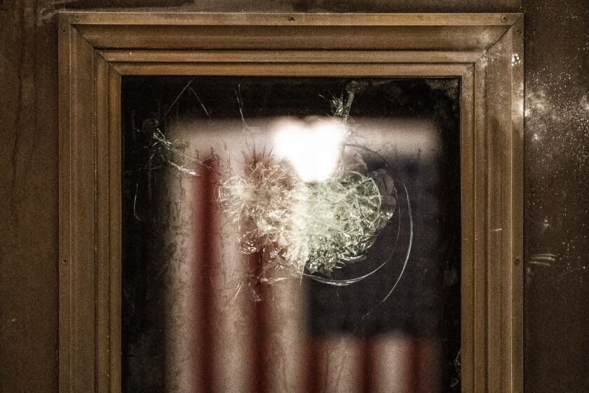 Glass smashed by protesters inside the U.S. Capitol Building.