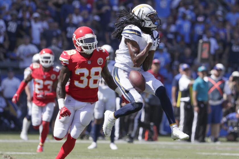 CARSON, CA, SUNDAY, SEPTEMBER 9, 2018 - Chargers receiver Travis Benjamin drops a long pass from quarterback Philip Rivers in the fourth quarter, after beating Chiefs safety Ron Parker downfield at StubHub Center. (Robert Gauthier/Los Angeles Times)
