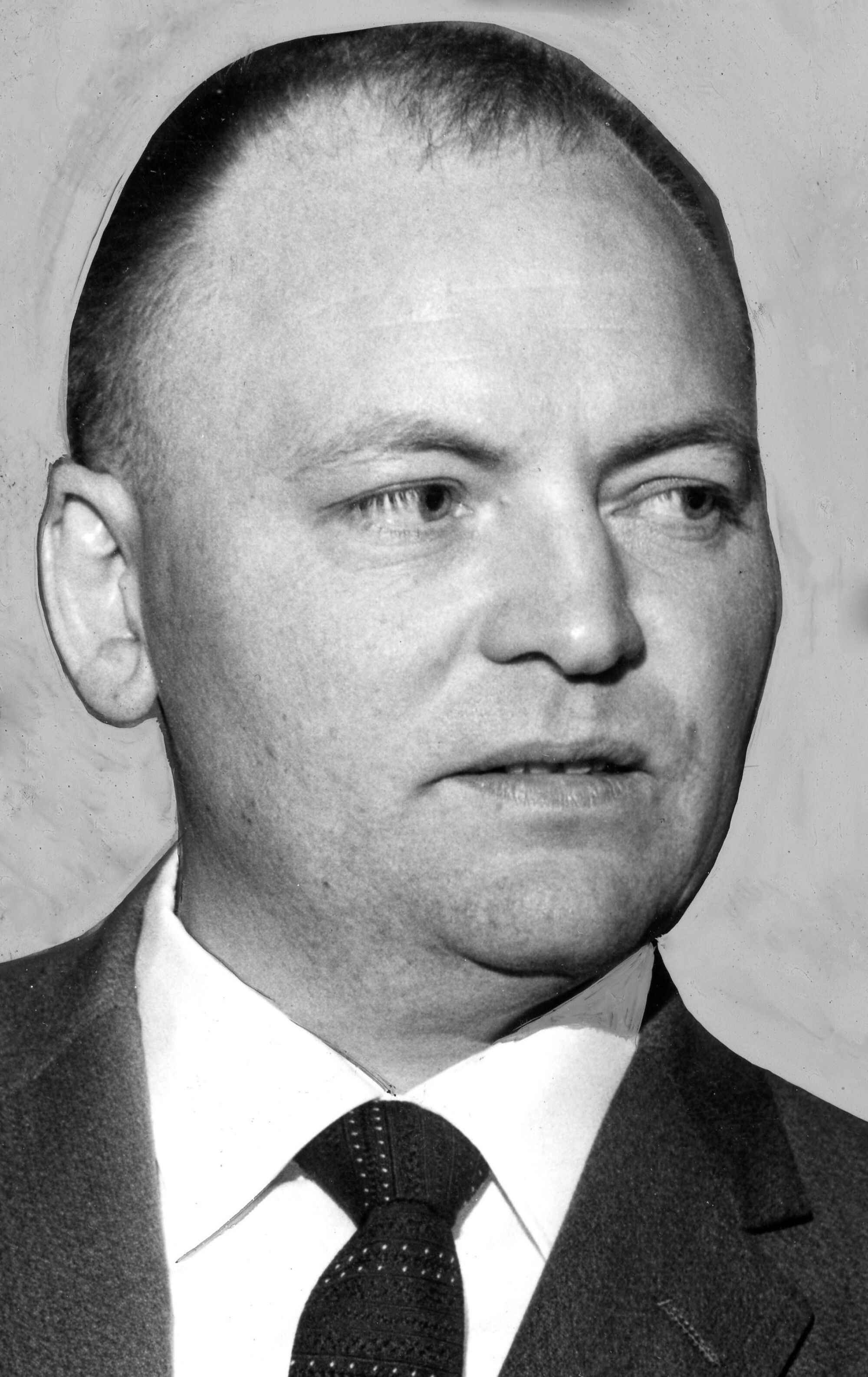 Headshot of Walter Wencke in 1960 with retouched background.