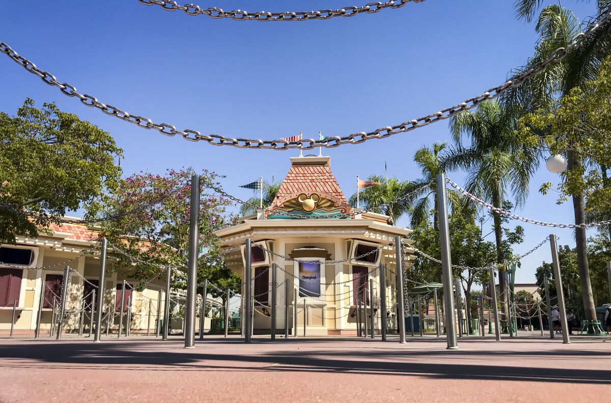 Ticket booths sit empty at Disneyland in Anaheim on Sept. 20. 
