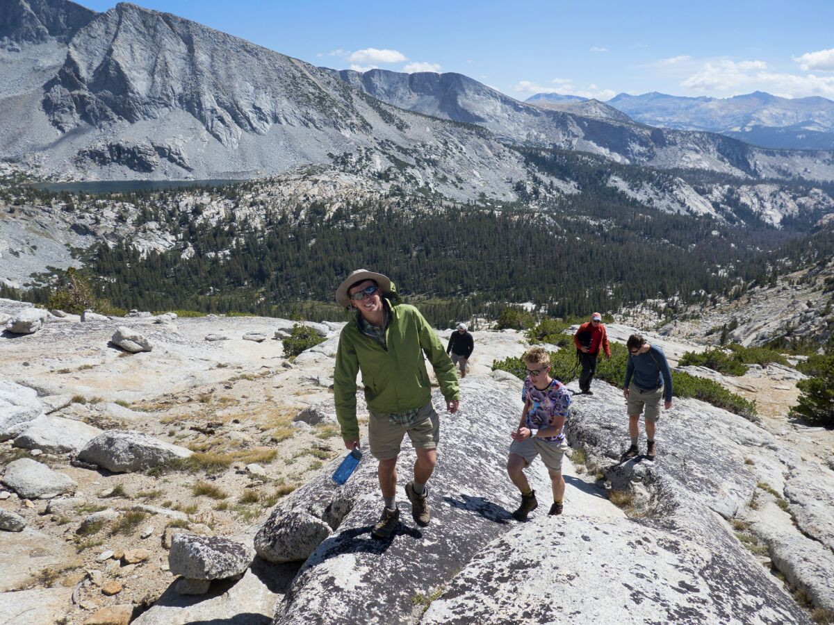 A guide leads hikers in the Yosemite National Park high country