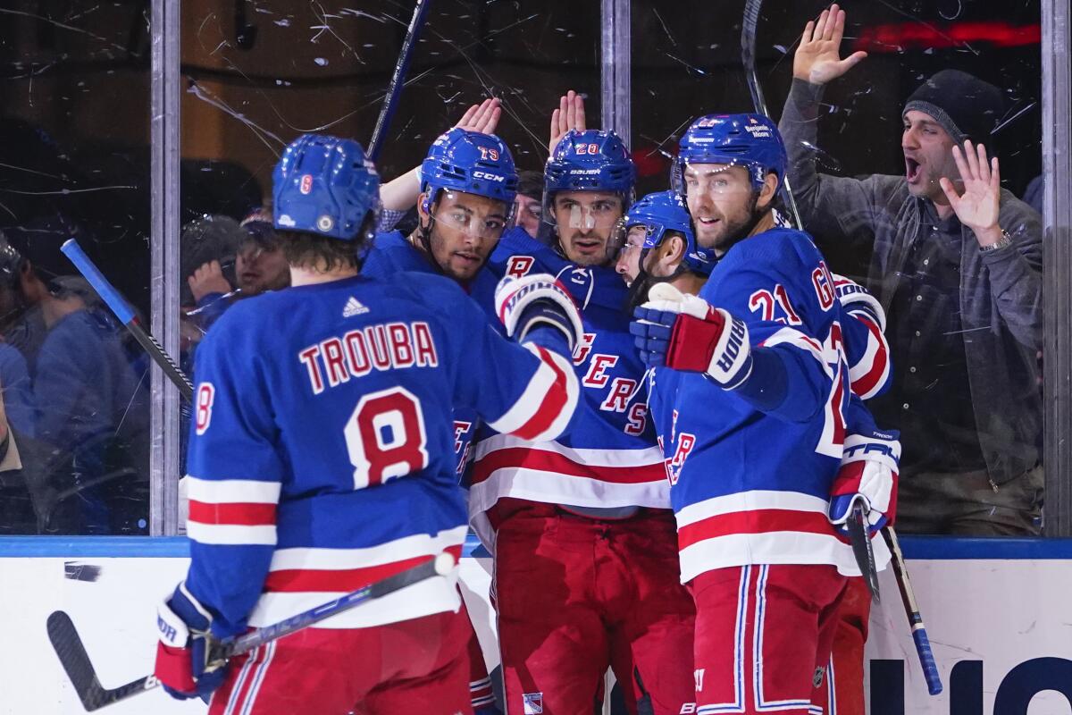 Bruins aim to keep win streak going, visit the Rangers