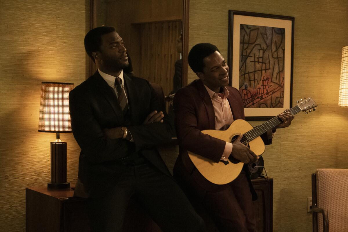 Aldis Hodge and Leslie Odom Jr. in the 1964 hotel setting of "One Night in Miami." 