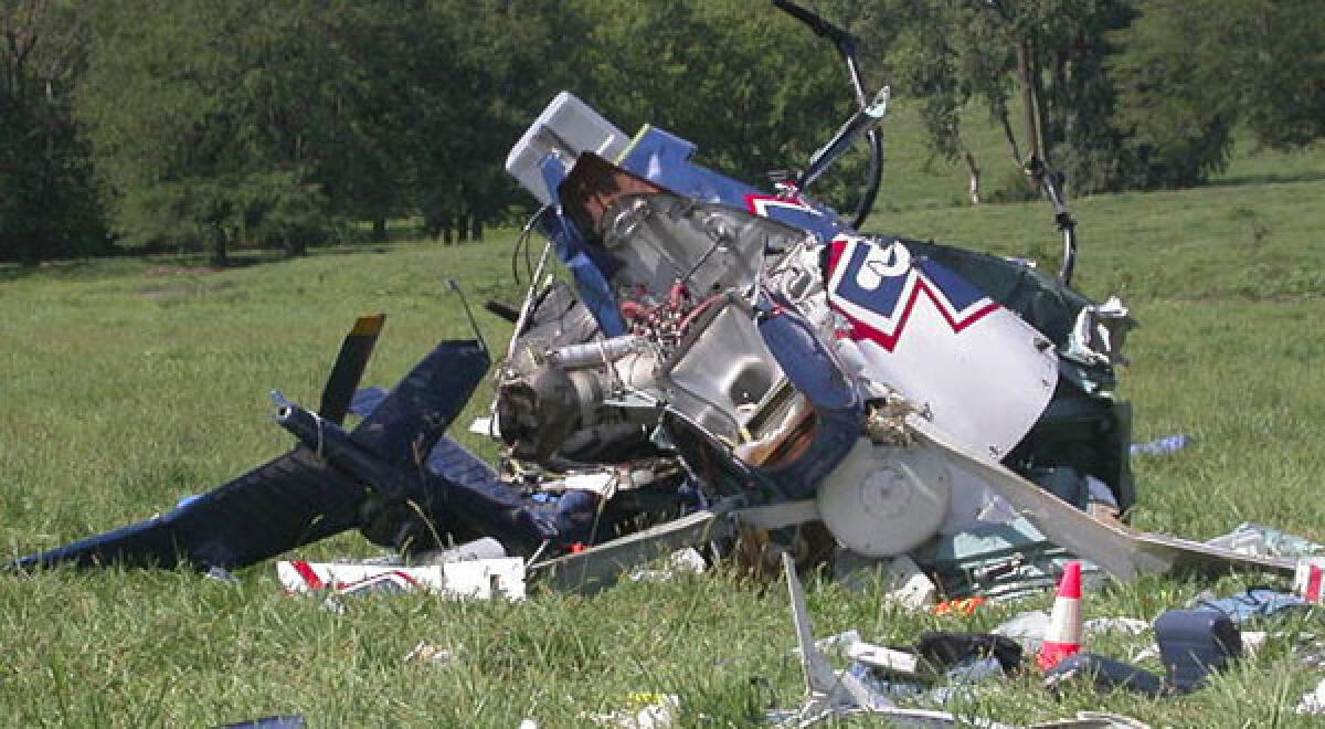 This photo shows the wreckage of a helicopter that crashed near Mosby, Mo. The pilot of an emergency medical helicopter may have been distracted by text messages.
