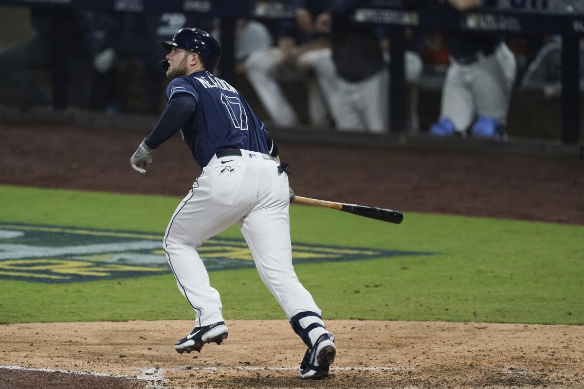 Tampa Bay Rays' Austin Meadows watches his ball after he hit a solo home run against the New York Yankees during the sixth inning in Game 2 of a baseball American League Division Series Tuesday, Oct. 6, 2020, in San Diego. (AP Photo/Jae C. Hong)