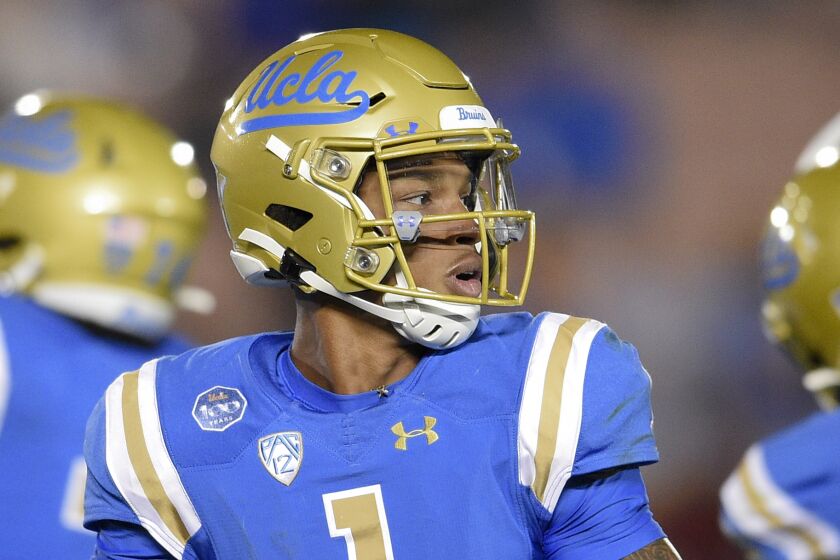 UCLA quarterback Dorian Thompson-Robinson in action during the second half of an NCAA college football game against Colorado