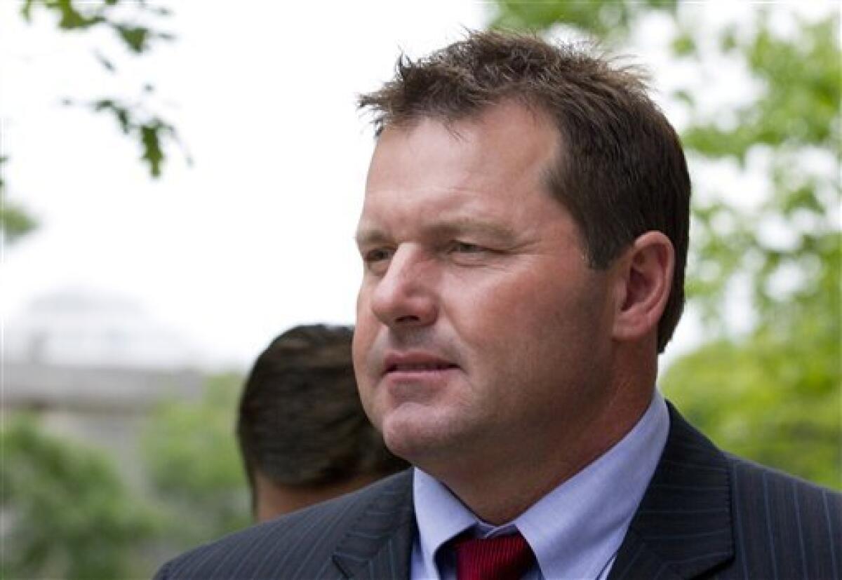 Roger Clemens, seven-time Cy Young Award winning pitcher, right