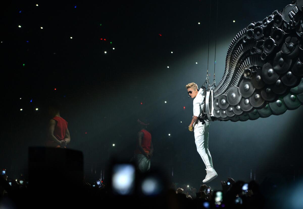 Justin Bieber performs during a concert in Paris on his 2013 "I Believe" tour.