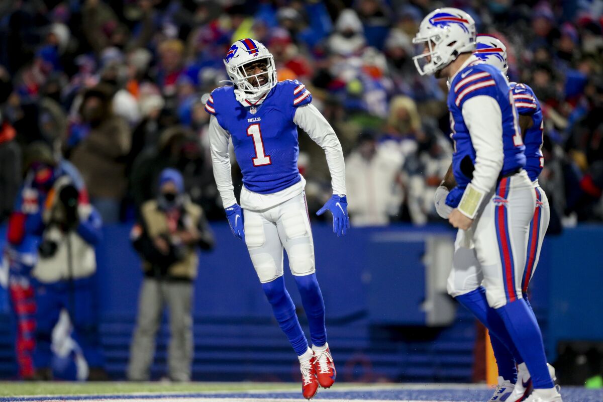 Bills receiver Emmanuel Sanders (1) celebrates his touchdown catch with quarterback Josh Allen (17) during the second half.