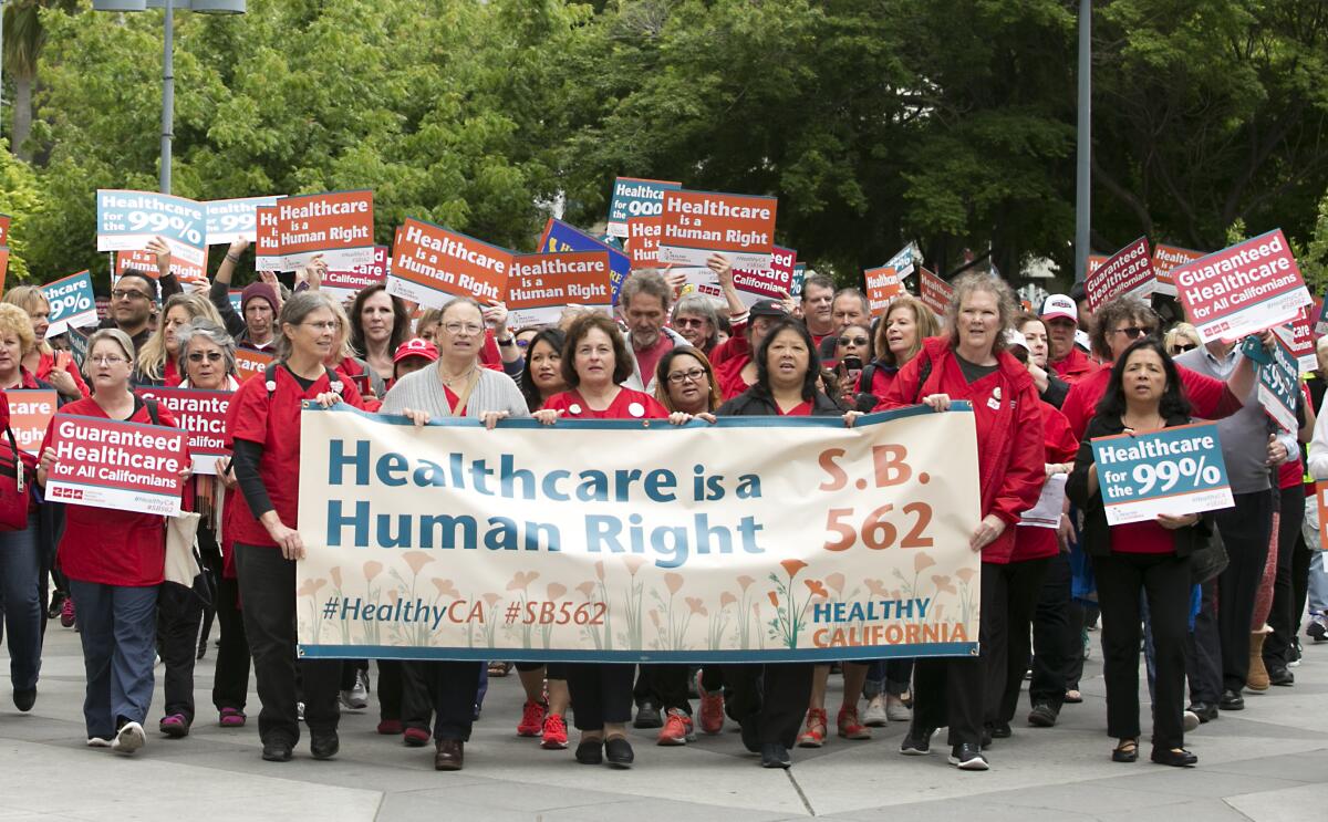 Supporters of single-payer healthcare march to the California Capitol.