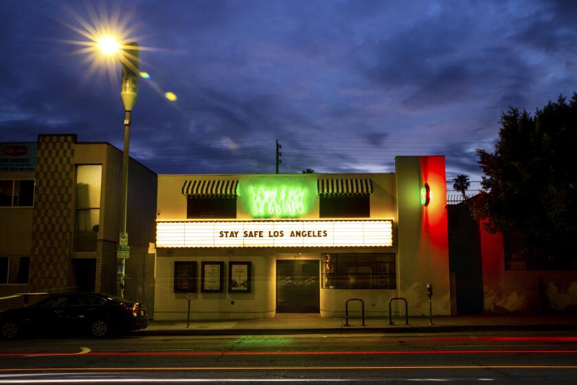 LOS ANGELES, CA - APRIL 19: The Fairfax Cinema in Los Angeles, CA, is closed and left the message, “Stay Safe Los Angeles,” on its marquee, during the coronavirus pandemic, photographed Sunday, April 19, 2020. (Jay L. Clendenin / Los Angeles Times)