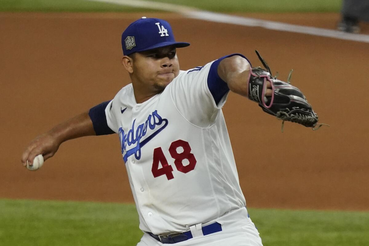 Los Angeles Dodgers pitcher Brusdar Graterol throws during the seventh inning in Game 6 of the baseball World Series.