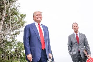 RANCHO PALOS VERDES-CA-SEPTEMBER 13, 2024: Former President Donald J. Trump arrives with Rancho Palos Verdes Mayor John Cruikshank, right, for a press conference at his Trump National Golf Course on Friday, September 13, 2024. (Christina House / Los Angeles Times)