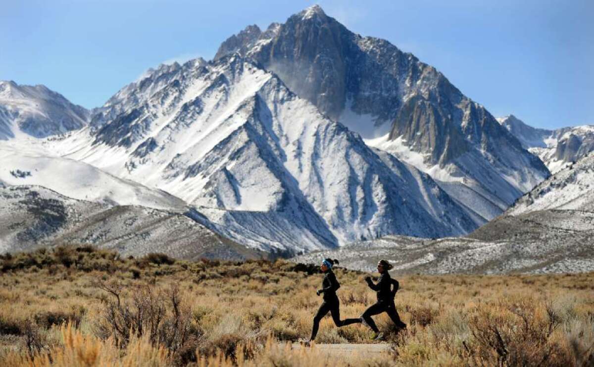 In this 2012 photo, runners take to a trail in the Mammoth Lakes region in California's Eastern Sierra.