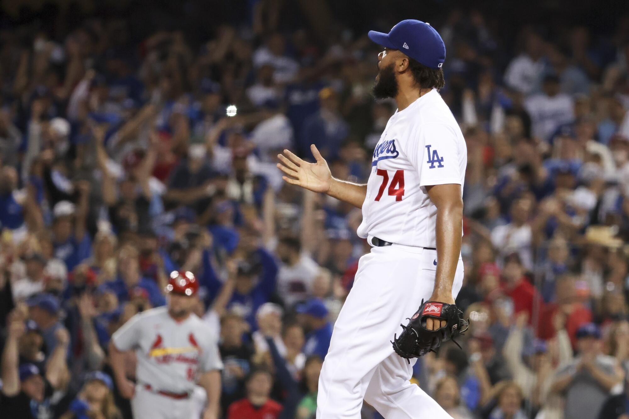 Los Angeles Dodgers relief pitcher Kenley Jansen reacts after a pitch