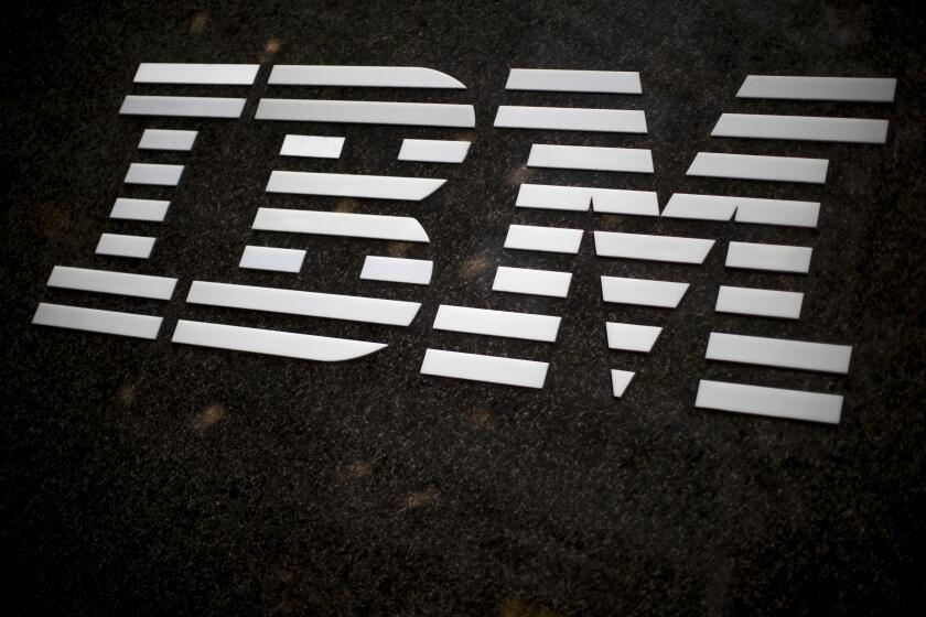 FILE- In this April 26, 2017, file photo, the IBM logo is displayed on the IBM building in Midtown Manhattan, in New York. IBM says it is getting out of the facial recognition business over concern about how it can be used for mass surveillance and racial profiling. (AP Photo/Mary Altaffer, File)