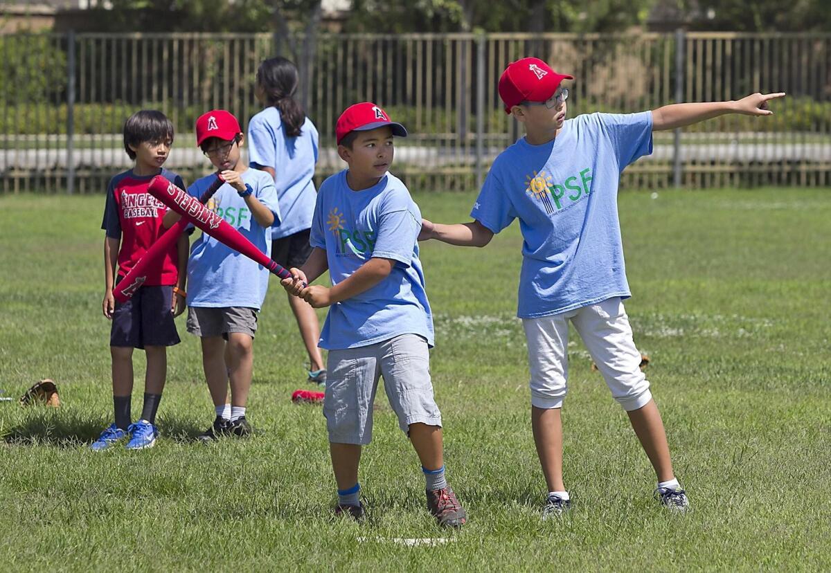 Students in the Angels Science of Baseball class at Stonegate Elementary School on Thursday learn how mathematical principles can be applied to baseball.