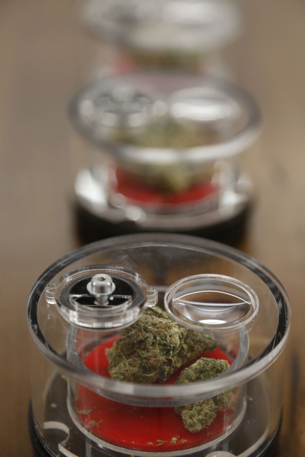 So-called bud pods enable customers to smell marijuana strains and look at them under a magnifying glass at the MedMen shop in West Hollywood.