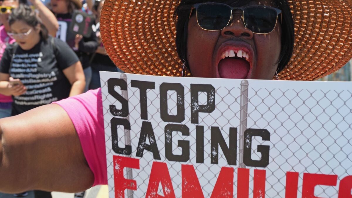 In this file photo taken on June 23, 2018 protesters led by a coalition of interfaith religious leaders demonstrate against US immigration policy that separates parents from their children, outside the Otay Mesa Detention Center in San Diego, California.
