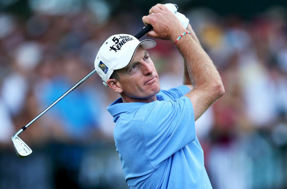 Jim Furyk watches his tee shot at No. 14 on Sunday during the final round of the PGA Championship at Oak Hill Country Club.