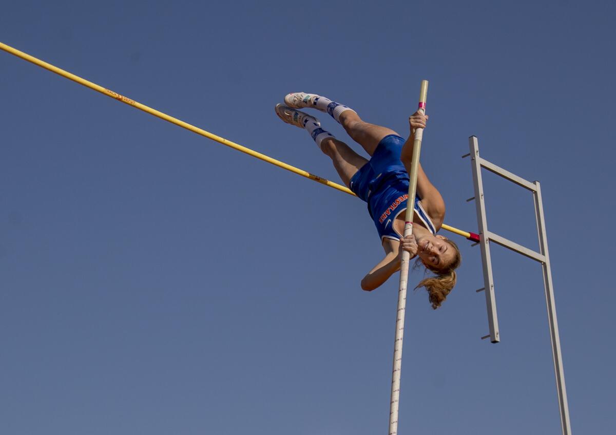 Paige Sommers of Westlake High clears 13 feet 9 inches to win the pole vault event at the Arcadia Invitational.