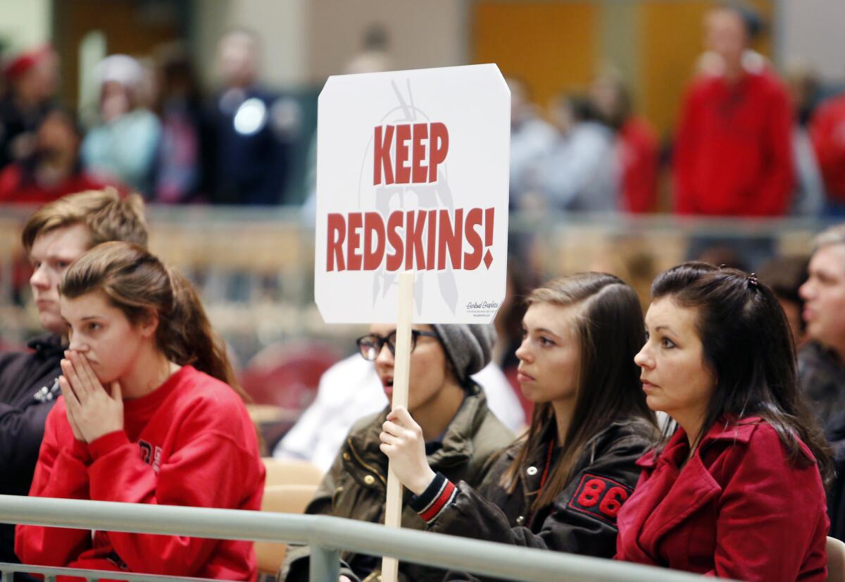 Students listen as the Lancaster New York School Board voted to retire the Redskins team mascot and nickname in that town last year. A similar effort is underway in California.