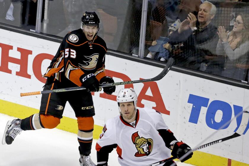 Ducks defenseman Shea Theodore celebrates after scoring during the third period against the Ottawa Senators on Jan. 13