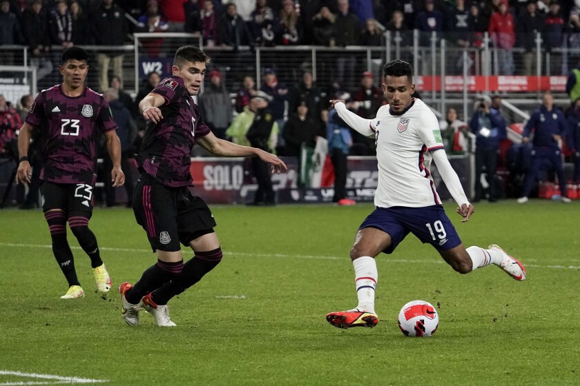 U.S. forward Jesus Ferreira (19) takes a sho