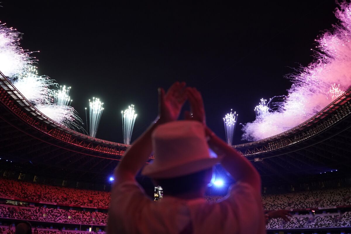 Fireworks explode during the closing ceremony in the Olympic Stadium at the 2020 Summer Olympics, Sunday, Aug. 8, 2021, in Tokyo, Japan. (AP Photo/David Goldman)