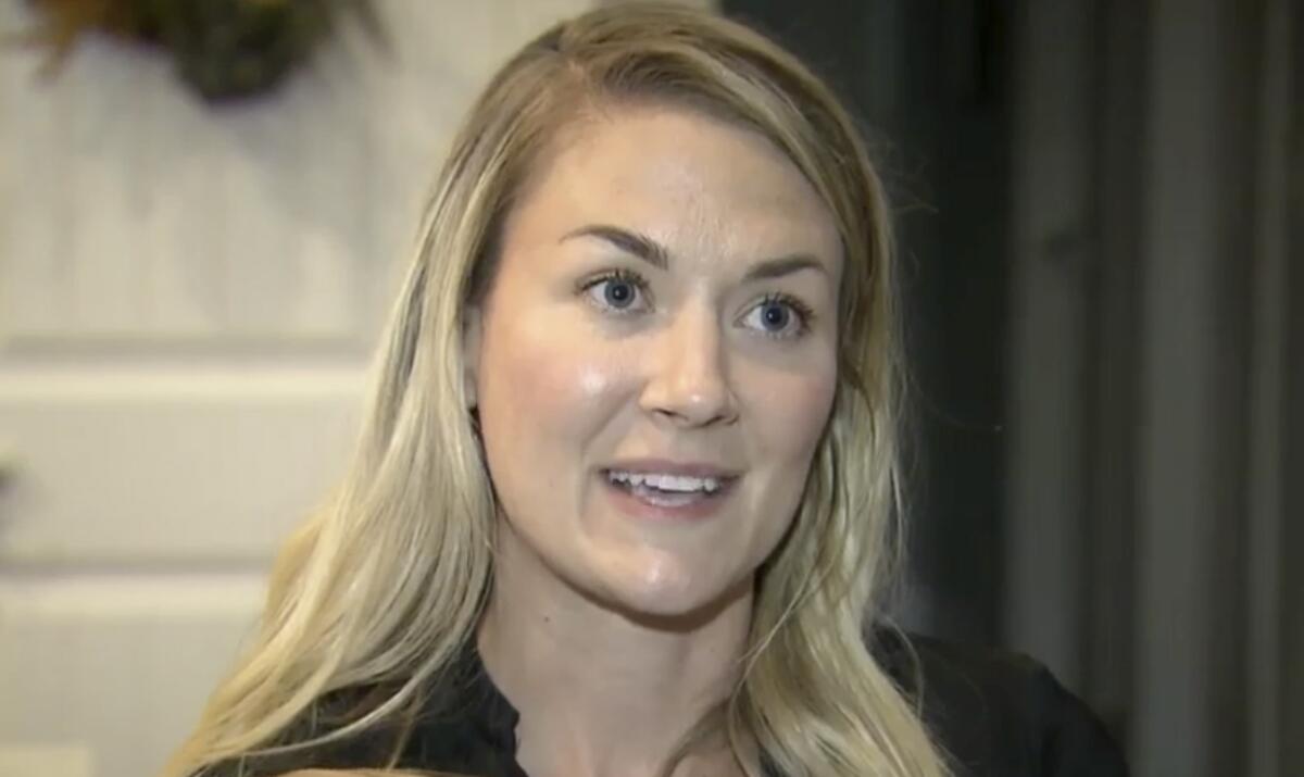 U.S. Army Capt. Emily Rainey speaks during a television interview in Southern Pines, N.C., in May 2020.