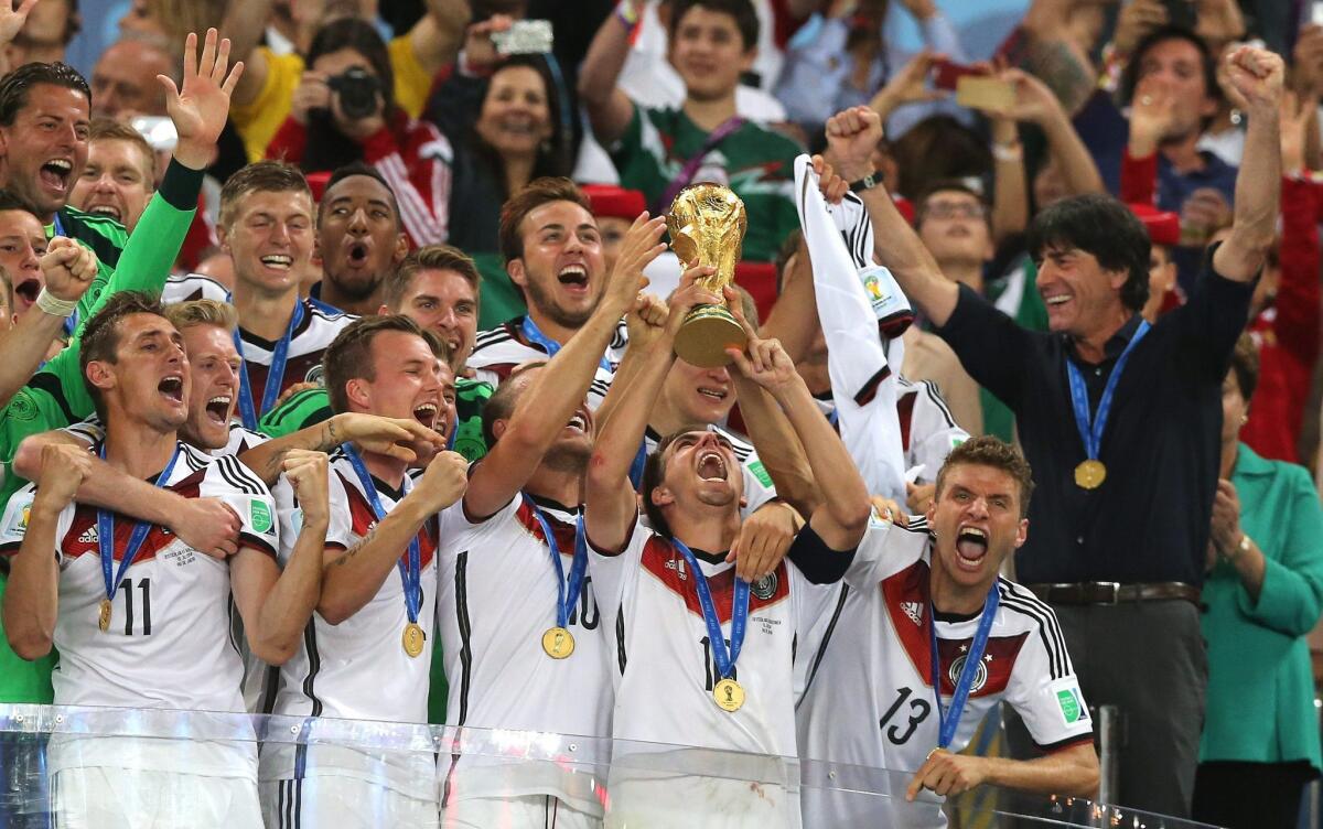 About 30 million people in the U.S. watched the 2014 FIFA World Cup final on Sunday. Germany defeated Argentina. Here, German captain Philipp Lahm lifts the trophy after the match in Rio de Janeiro.