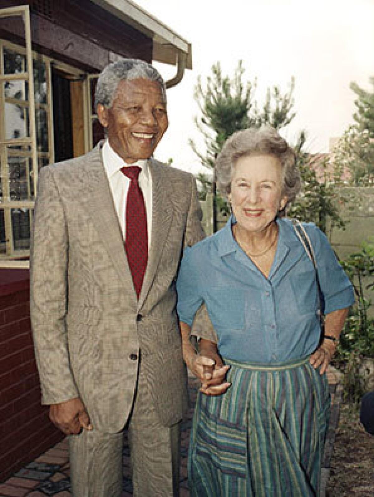Suzman visits Nelson Mandela at his Soweto home after his release from prison in 1990. She had visited him in 1967 at Robben Island during his imprisonment.