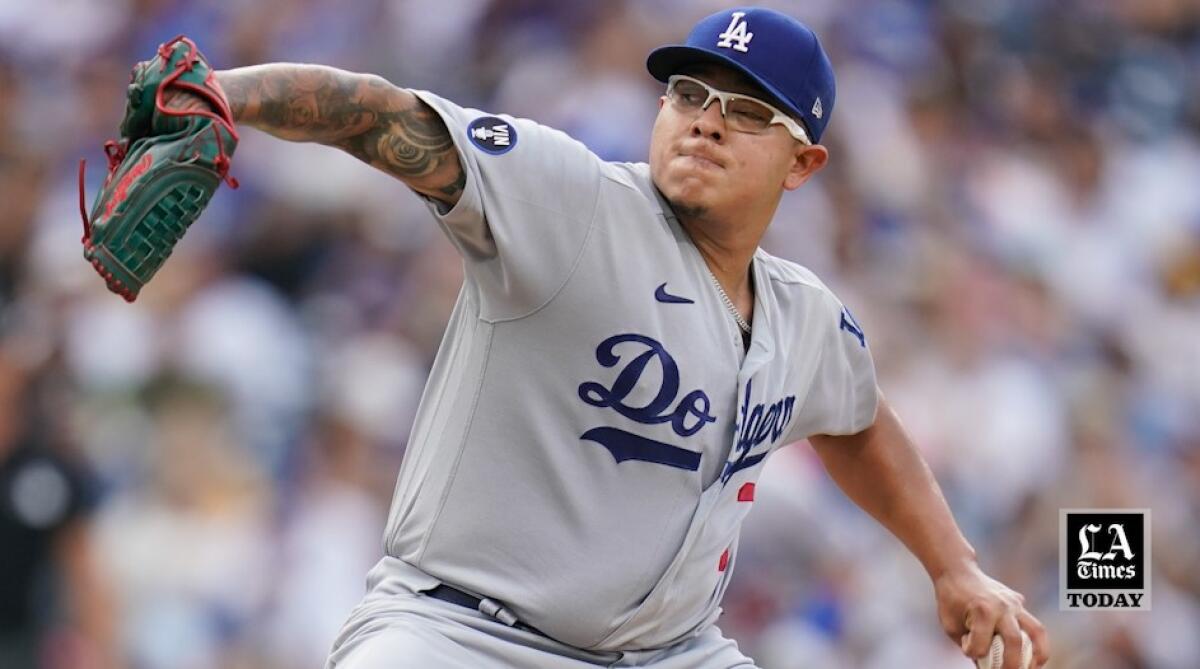 Dodgers pitcher Julio Urías winds up and throws from the mound