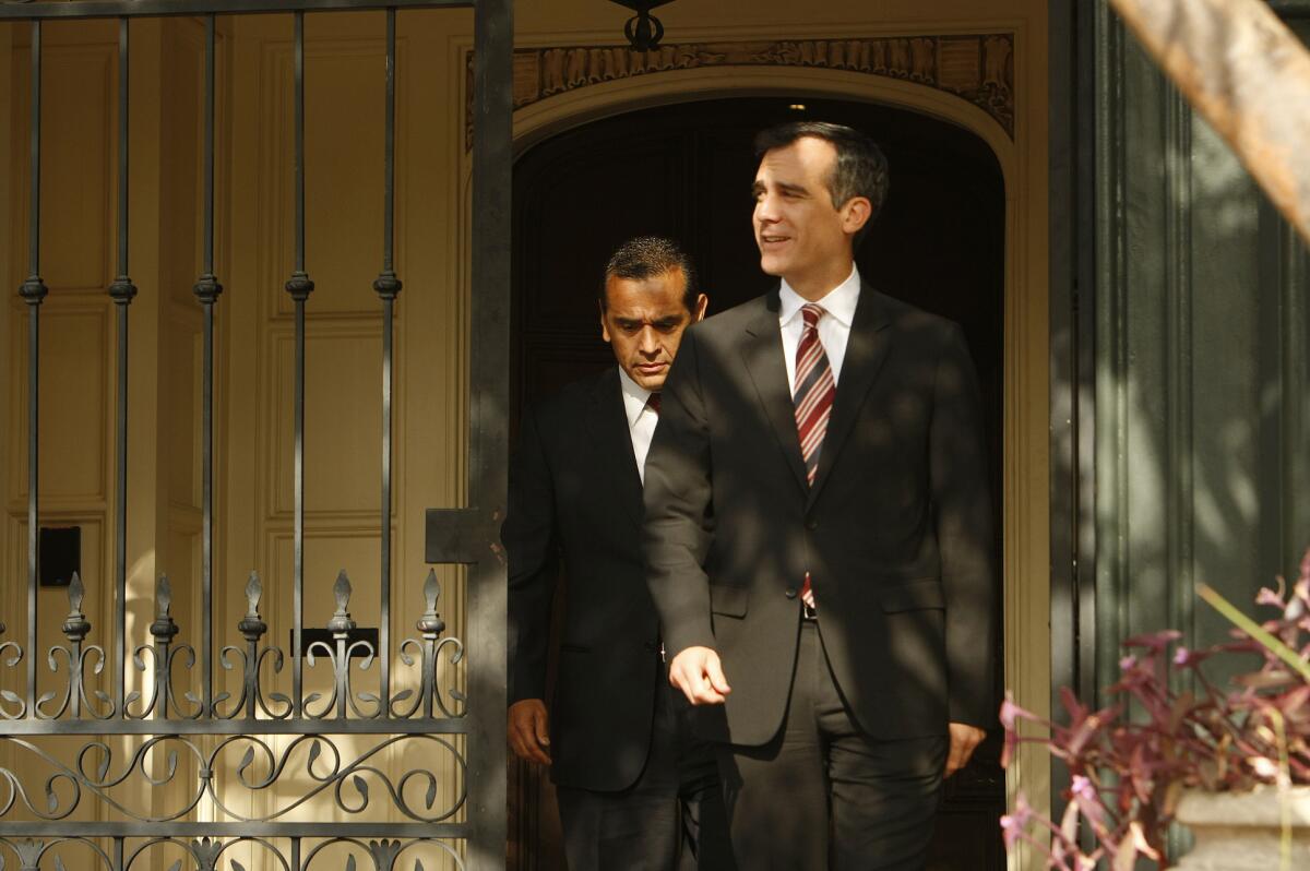 Los Angeles Mayor Eric Garcetti and former Mayor Antonio Villaraigosa at Getty House, the official mayor's mansion, earlier this year.