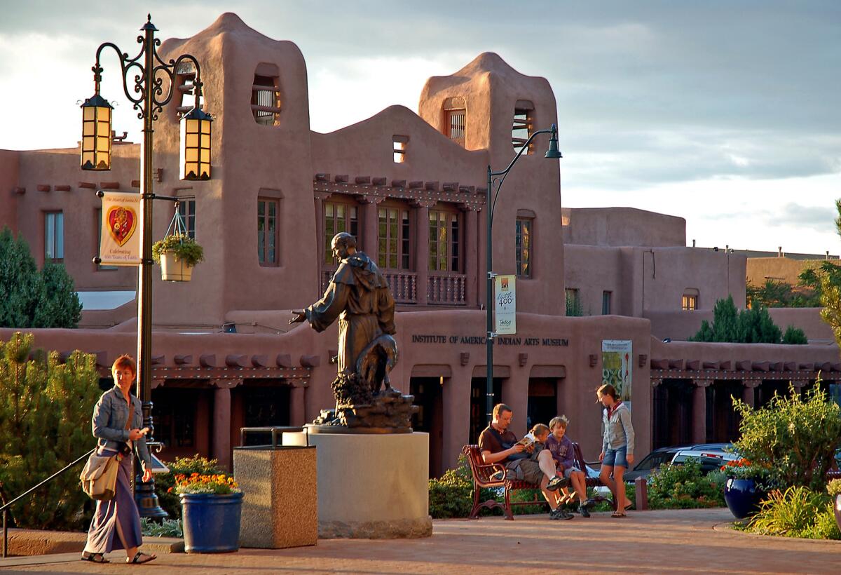 A statue of 19th century Archbishop Jean-Baptiste Lamy stands in downtown Santa Fe, N.M., across the street from the Institute of American Indian Arts Museum.